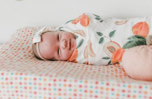 Swaddled baby looking peaceful